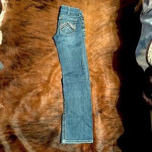 Airat boot cut women’s denim jeans, size 26L, color is a light wash.